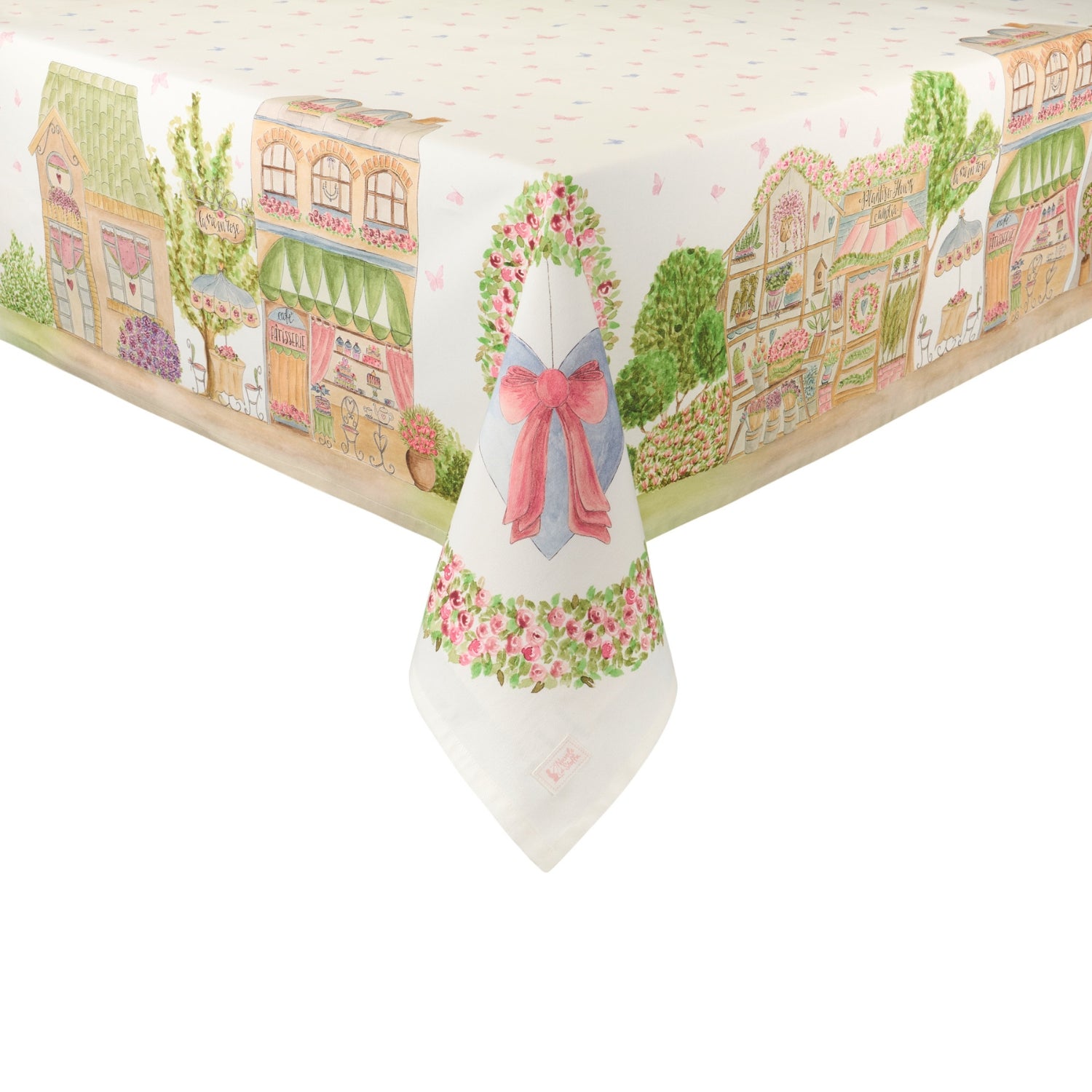 Tovaglia Nuvole di Stoffa linea "La Vie en Rose" con illustrazioni di negozi parigini e pasticcerie vintage. Decorazione con ghirlande di rose, cuori azzurri con fiocchi rosa e farfalle su fondo bianco.