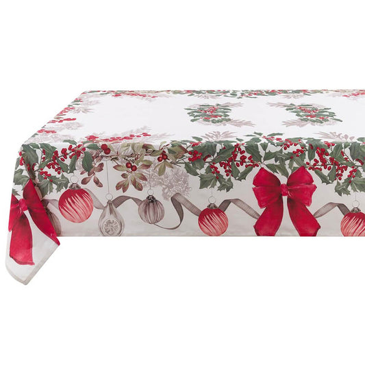 Tovaglia natalizia bianca Blanc Mariclò con stampa perimetrale di ghirlande di agrifoglio, bacche rosse e grandi fiocchi scarlatti con palline di Natale vintage. Design elegante per tavole festive.