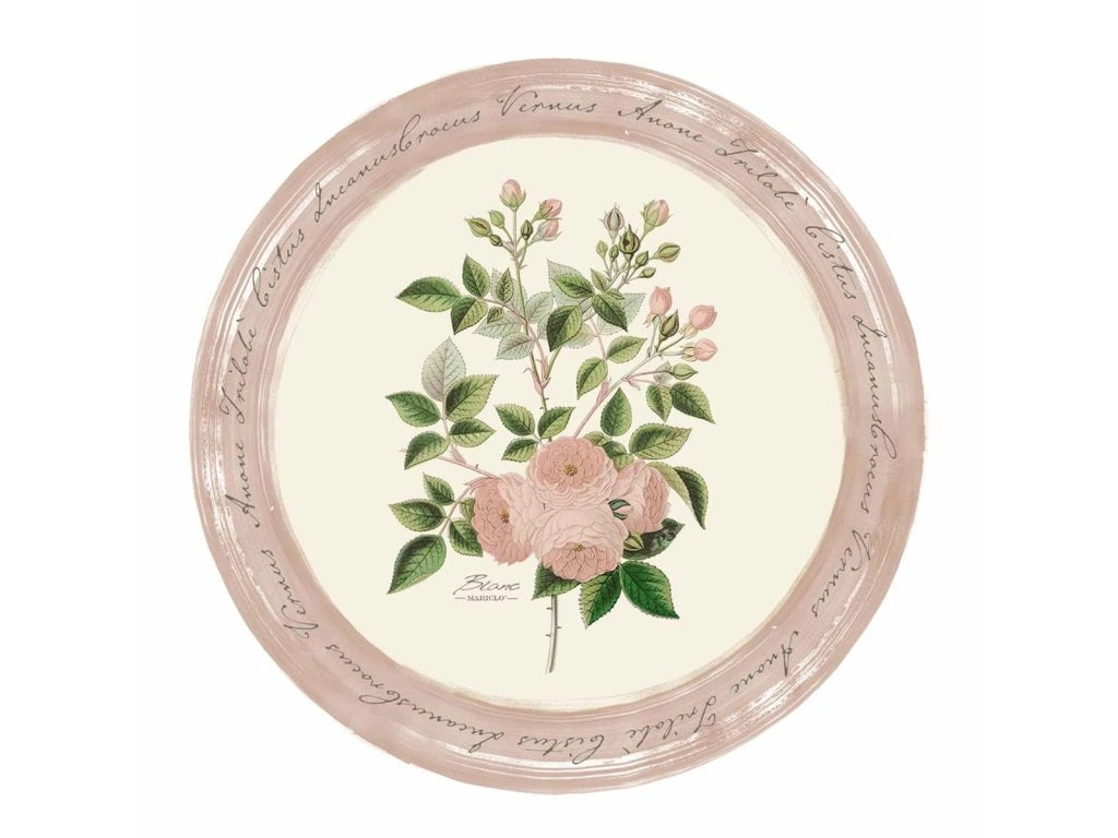 Tovaglietta tonda in vinile Blanc Mariclò collezione "Le Botanique". Al centro presenta un'illustrazione botanica di rose rosa e boccioli su fondo crema, circondata da una cornice rosa antico con scritte in corsivo calligrafico.
