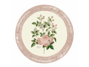 Tovaglietta tonda in vinile Blanc Mariclò collezione "Le Botanique". Al centro presenta un'illustrazione botanica di rose rosa e boccioli su fondo crema, circondata da una cornice rosa antico con scritte in corsivo calligrafico.