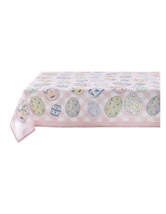 Tovaglia rettangolare della collezione "Pretty Easter" caratterizzata da una base a scacchi bianchi e rosa confetto con una balza in tinta unita sul bordo inferiore. Il tessuto è interamente stampato con uova di Pasqua decorate da motivi floreali, fiocchi gialli e trame geometriche nei toni del pastello, perfetta per apparecchiare la tavola festiva in stile shabby chic.