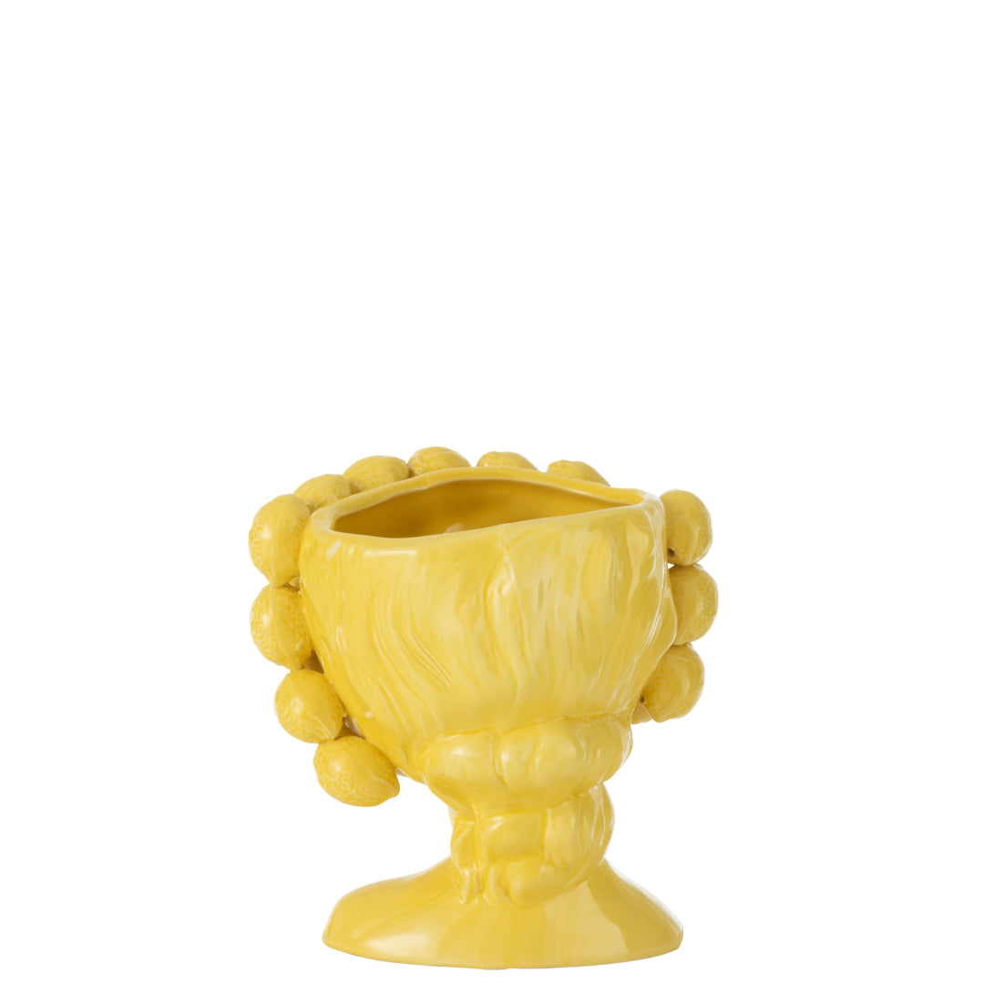 Portavaso in ceramica gialla lucida a forma di testa di ragazza, i cui capelli sono rivestiti da limoni in rilievo disposte su più file. Complemento d'arredo dal design fantasioso firmato Jolipa, ideale come vaso decorativo o idea regalo originale per la casa.