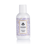 Fragranza per bucato in flacone bianco decorato con motivo botanico a rami e foglie lilla, etichetta "Venere" firmata Chiara Firenze. Profumatore per lavatrice elegante con logo a giglio, ideale per profumare i tessuti o come idea regalo raffinata.